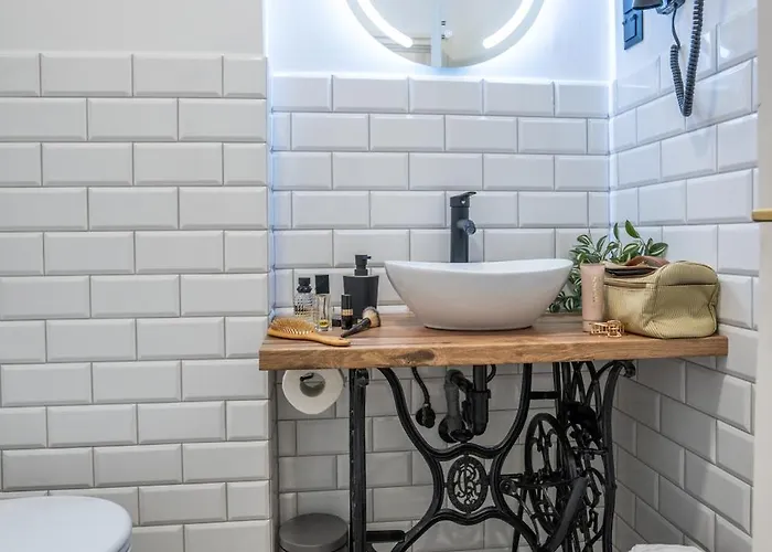 V62 Apartments- Downtown Apart Otel 4*